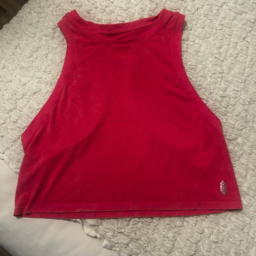 FP Movement hot pink muscle tank, never worn, only flaw is tag is crossed out,